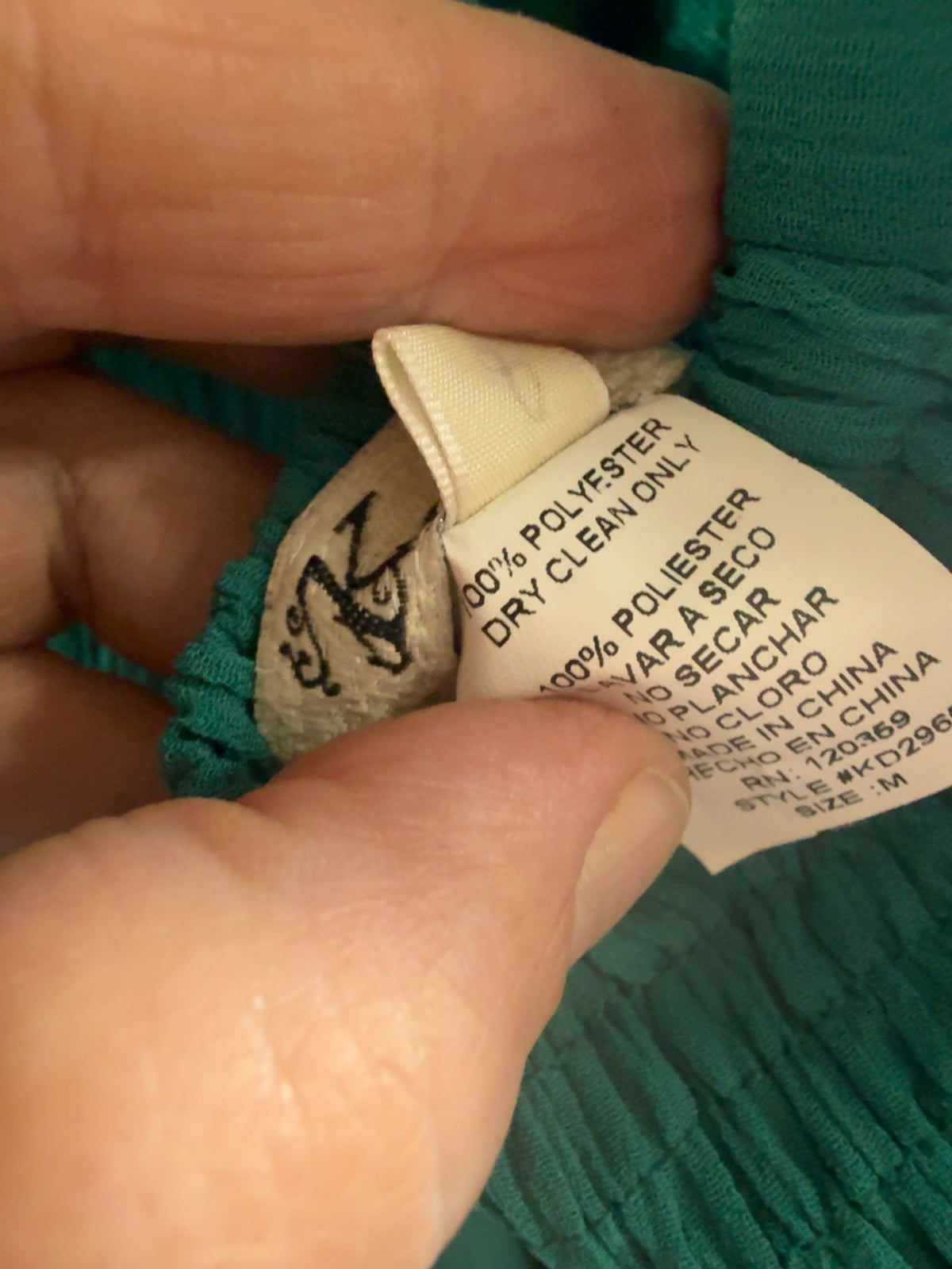 Kratia emerald green halter formal dress in women’s size medium.