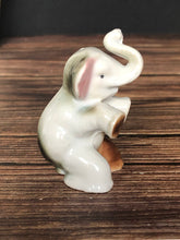 Load image into Gallery viewer, High Gloss Porcelain Elephant Sitting Trunk Up with Pink Ears Made in Japan