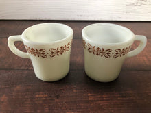 Load image into Gallery viewer, Pyrex White Milk Glass Copper Filigree Coffee Cups, Mid Century Milk Glass Pyrex Coffee Mugs (set of 2)