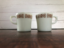 Load image into Gallery viewer, Pyrex White Milk Glass Copper Filigree Coffee Cups, Mid Century Milk Glass Pyrex Coffee Mugs (set of 2)