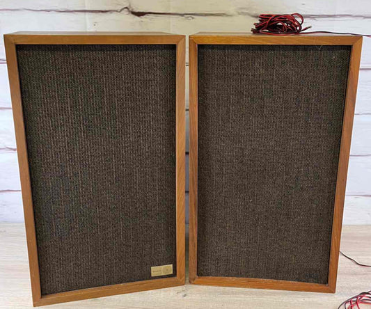 Vintage Realistic MC-1000 Stereo Speakers with Wooden Cabinets and Fabric Grilles.