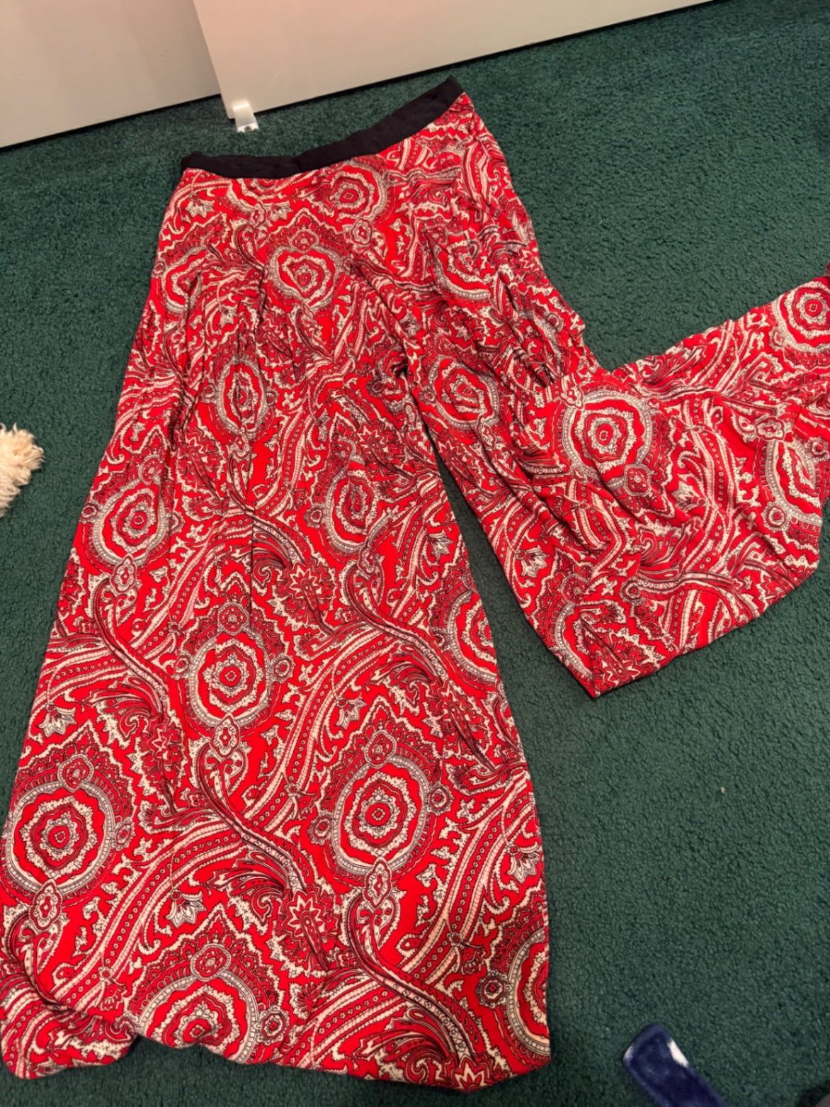 S-Staring at stars Red and beige Likely a soft, woven fabric 6 Pants