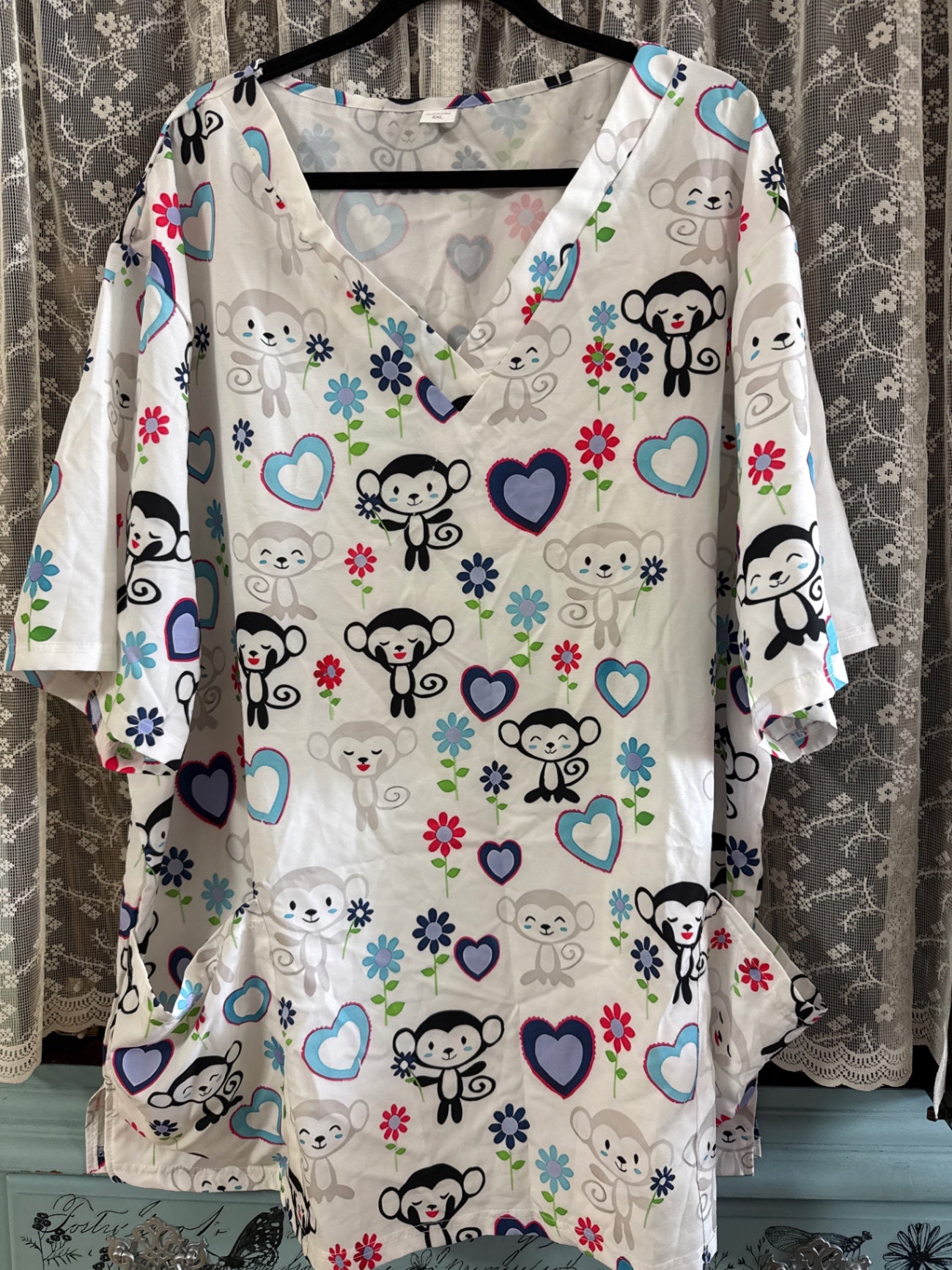 Happy Scrubs White with multicolor pattern (black, red, blue, green, gray) Unknown fabric, likely lightweight polyester 5XL Dress Very Good