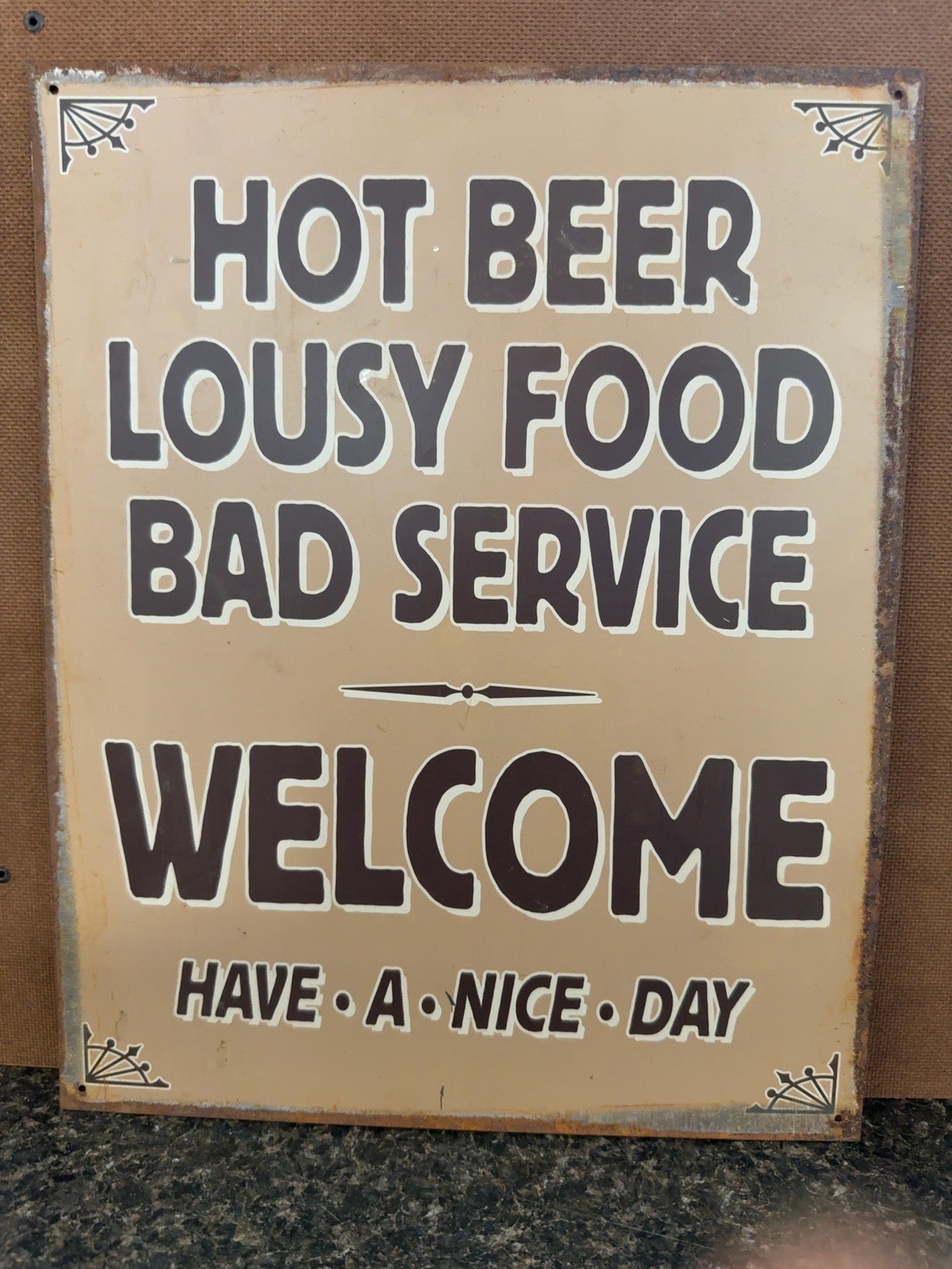 2008 SIGN OF THE TIMES “HOT BEER, LOUSY FOOD, BAD SERVICE” METAL SIGN