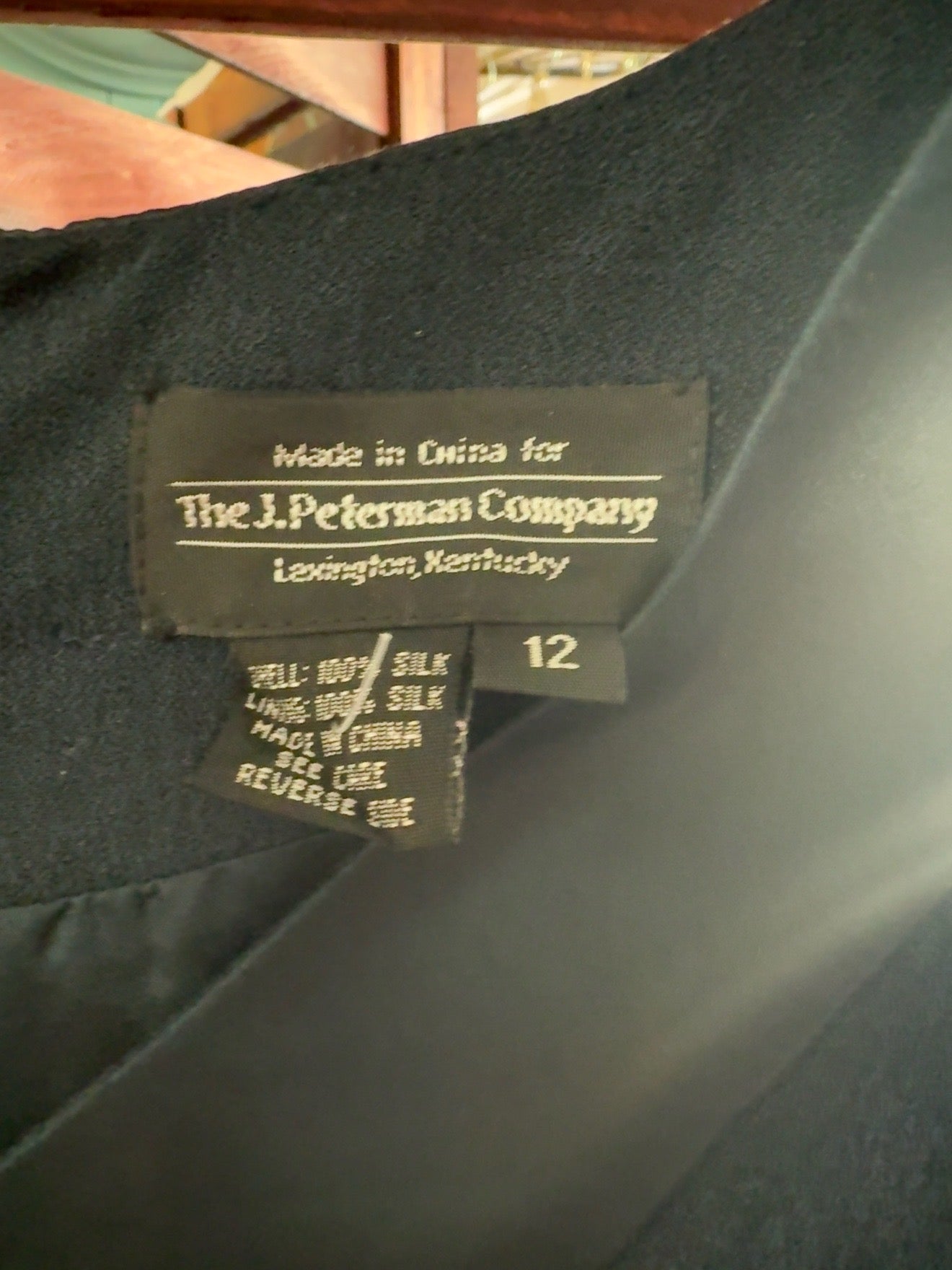 The J. Peterman Company black sleeveless maxi dress in women’s size 12.