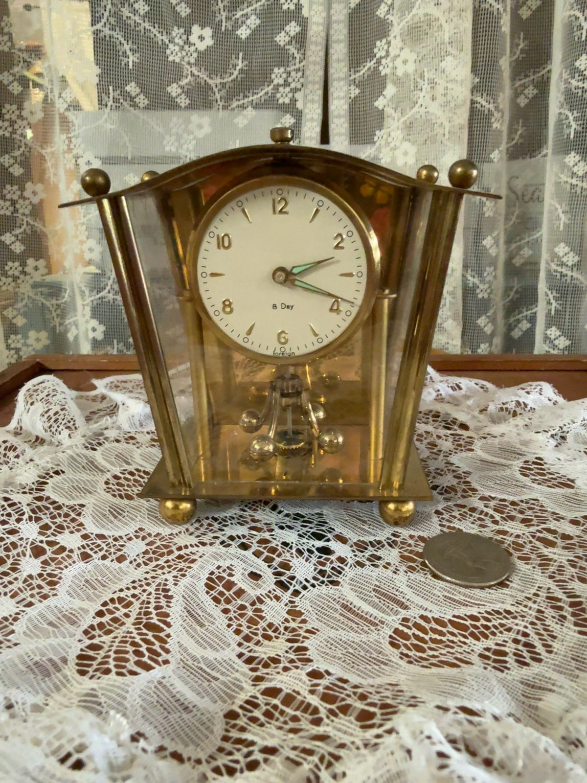 Vintage 8-Day Brass Anniversary Clock with Glass Panels and Rotating Pendulum
