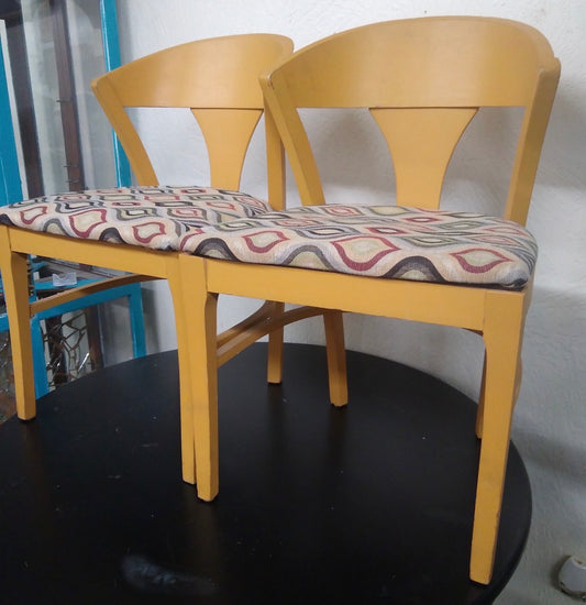 A Pair of Mid-Century Modern Chairs with Yellow Painted Frames and Geometric Upholstery