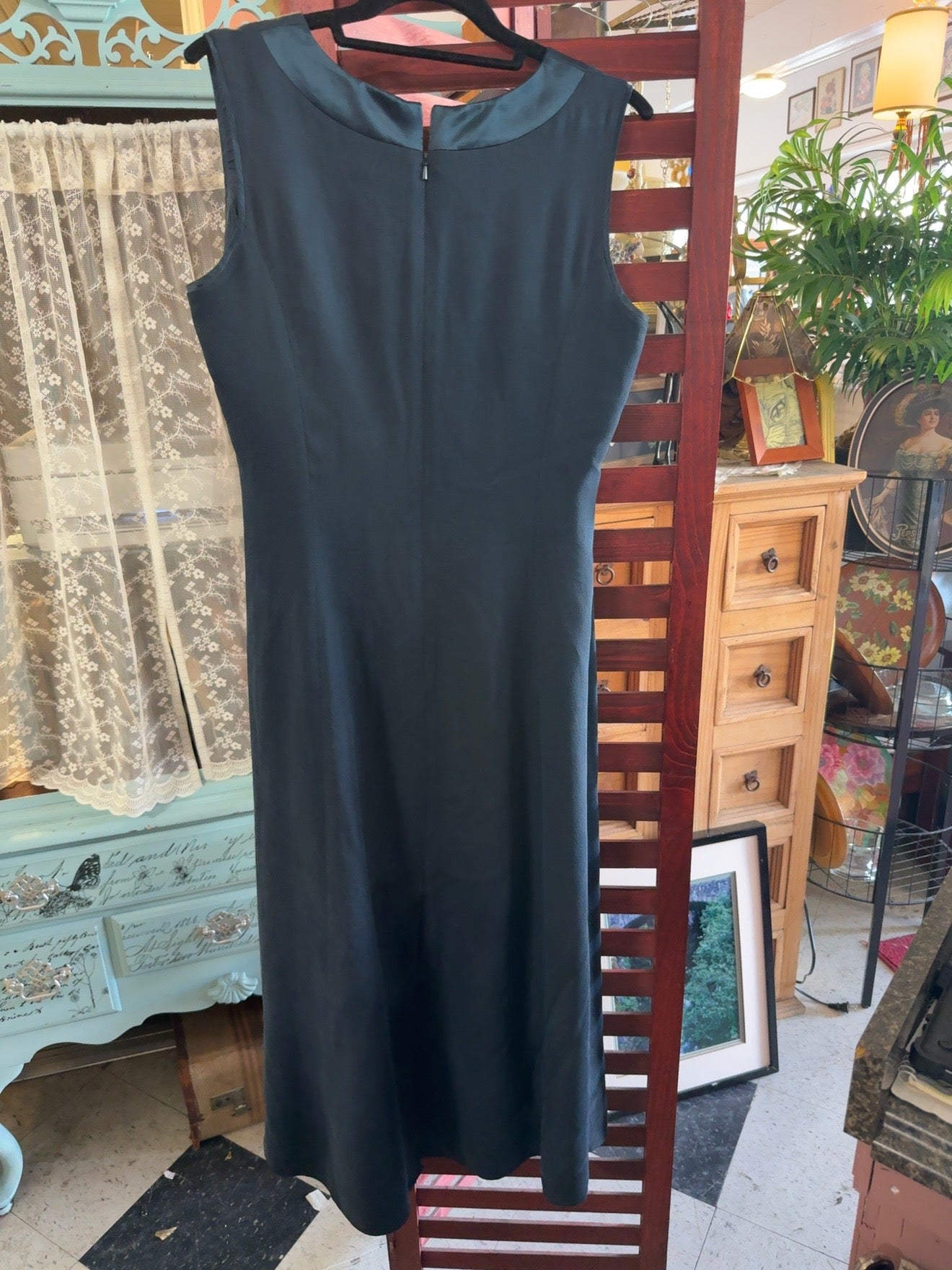 The J. Peterman Company black sleeveless maxi dress in women’s size 12.