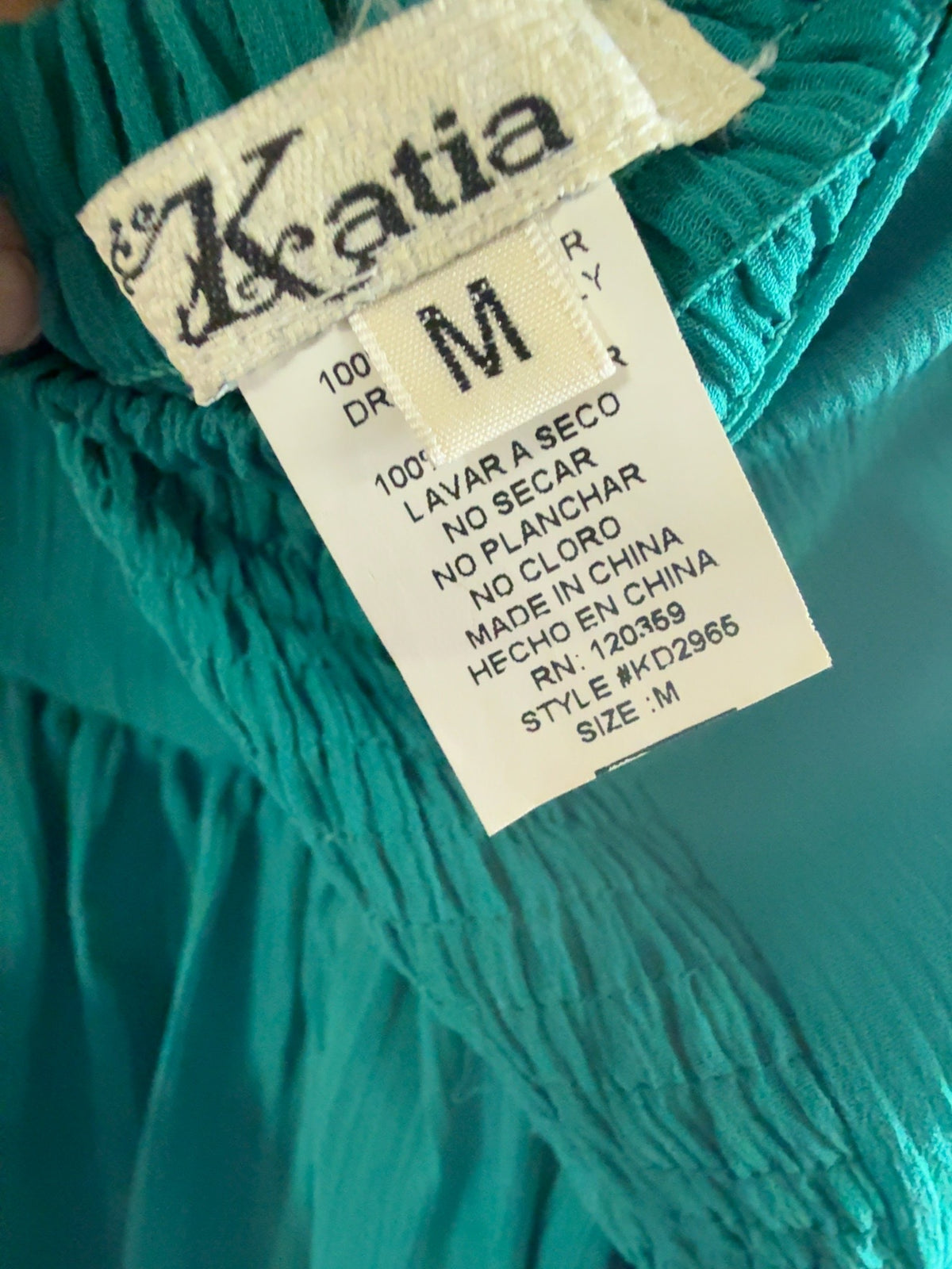 Kratia emerald green halter formal dress in women’s size medium.