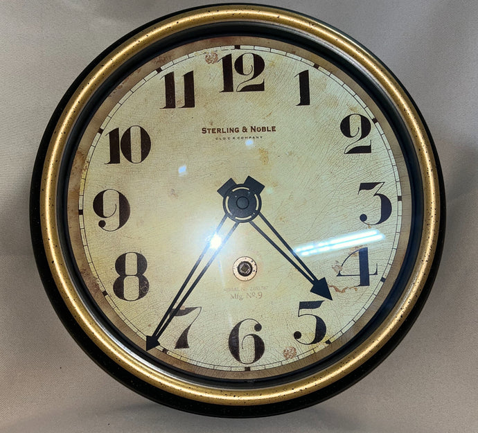 2000's Sterling & Noble Clock, Black and Gold Rim