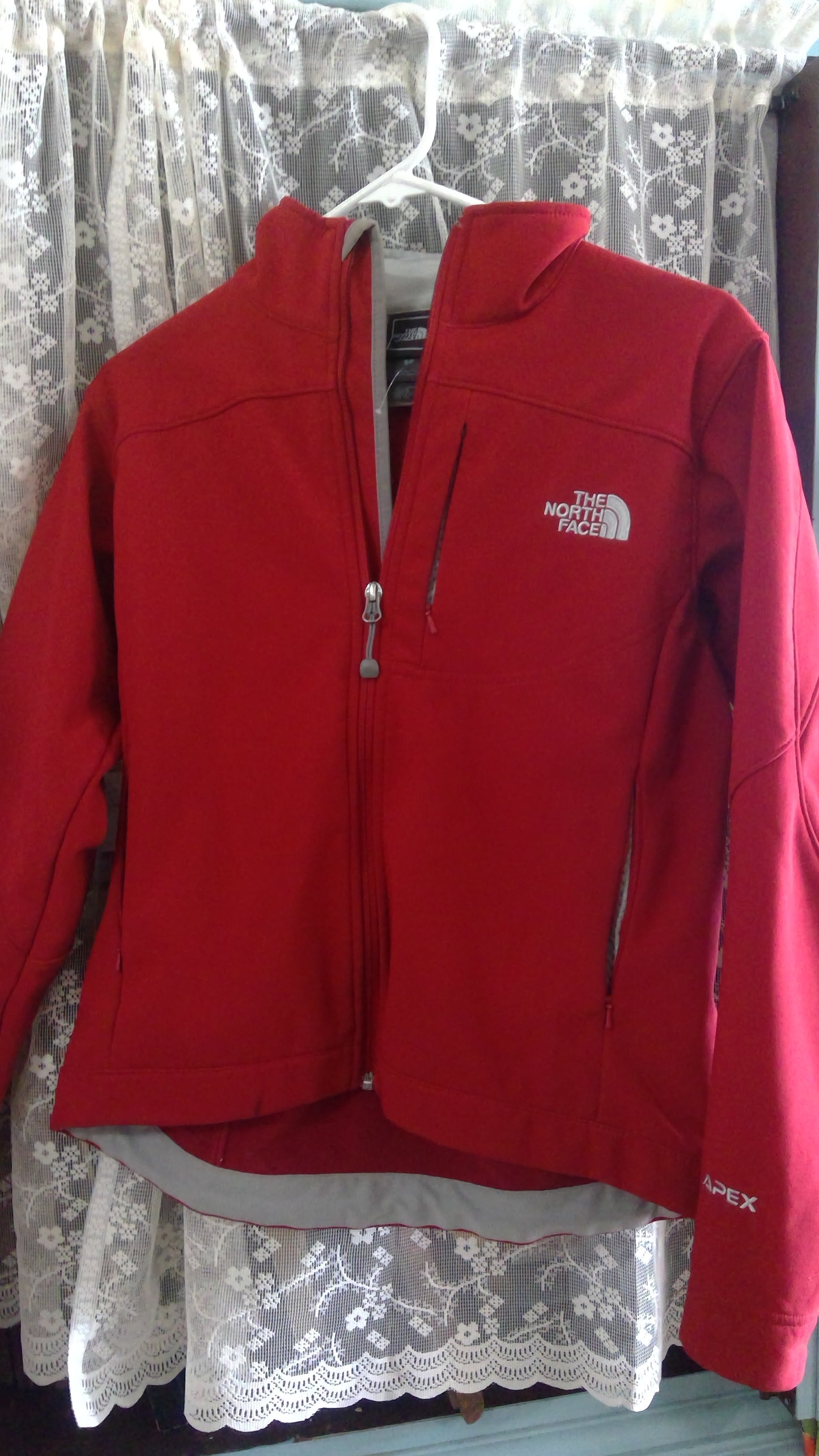 Red North Face Wind Breaker