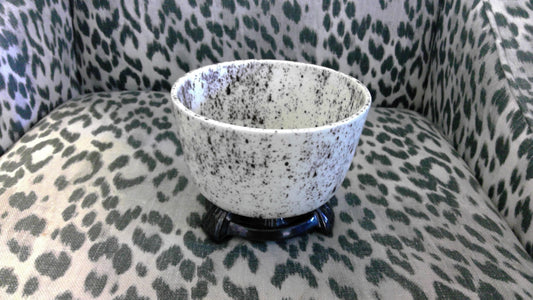 Artisan Speckled Ceramic Bowl with Black Three-Footed Base
