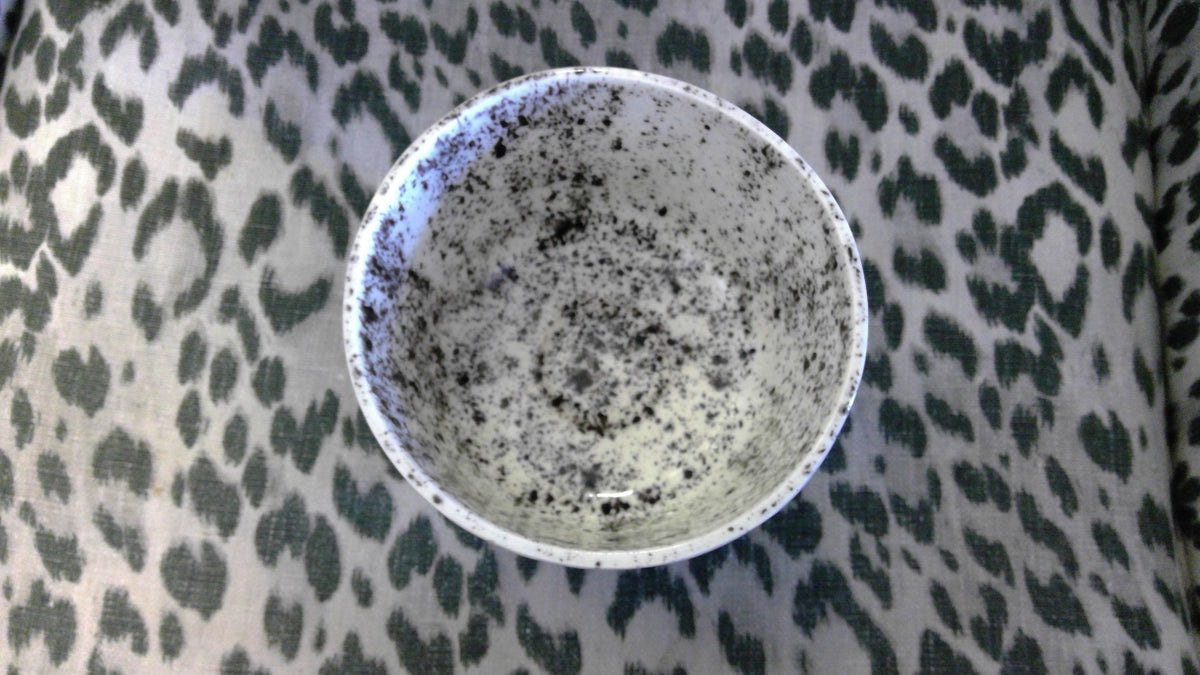Artisan Speckled Ceramic Bowl with Black Three-Footed Base