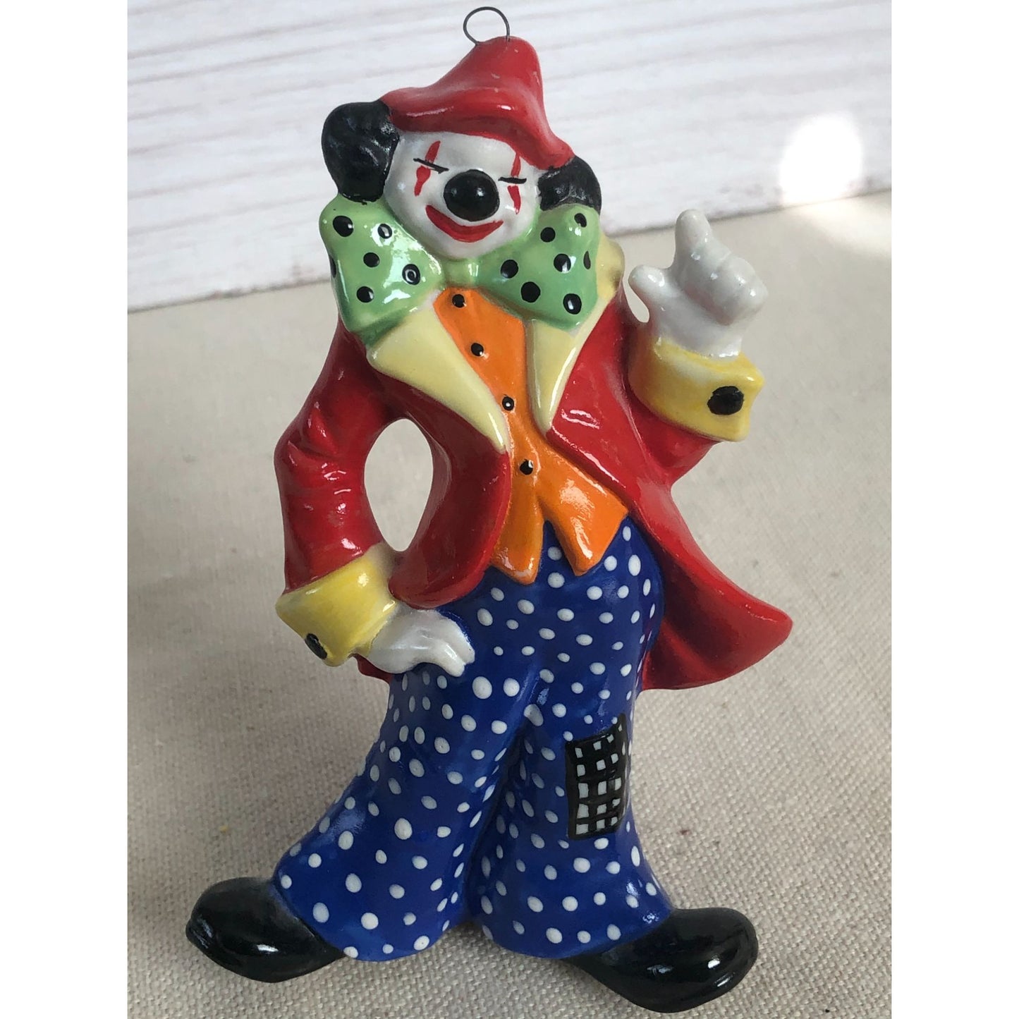 1984 Ceramic Squinting Clown Red Coat Polka Dot Pants Ornament Signed "Paula"