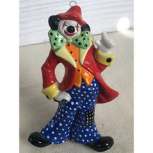 Load image into Gallery viewer, 1984 Ceramic Squinting Clown Red Coat Polka Dot Pants Ornament Signed &quot;Paula&quot;
