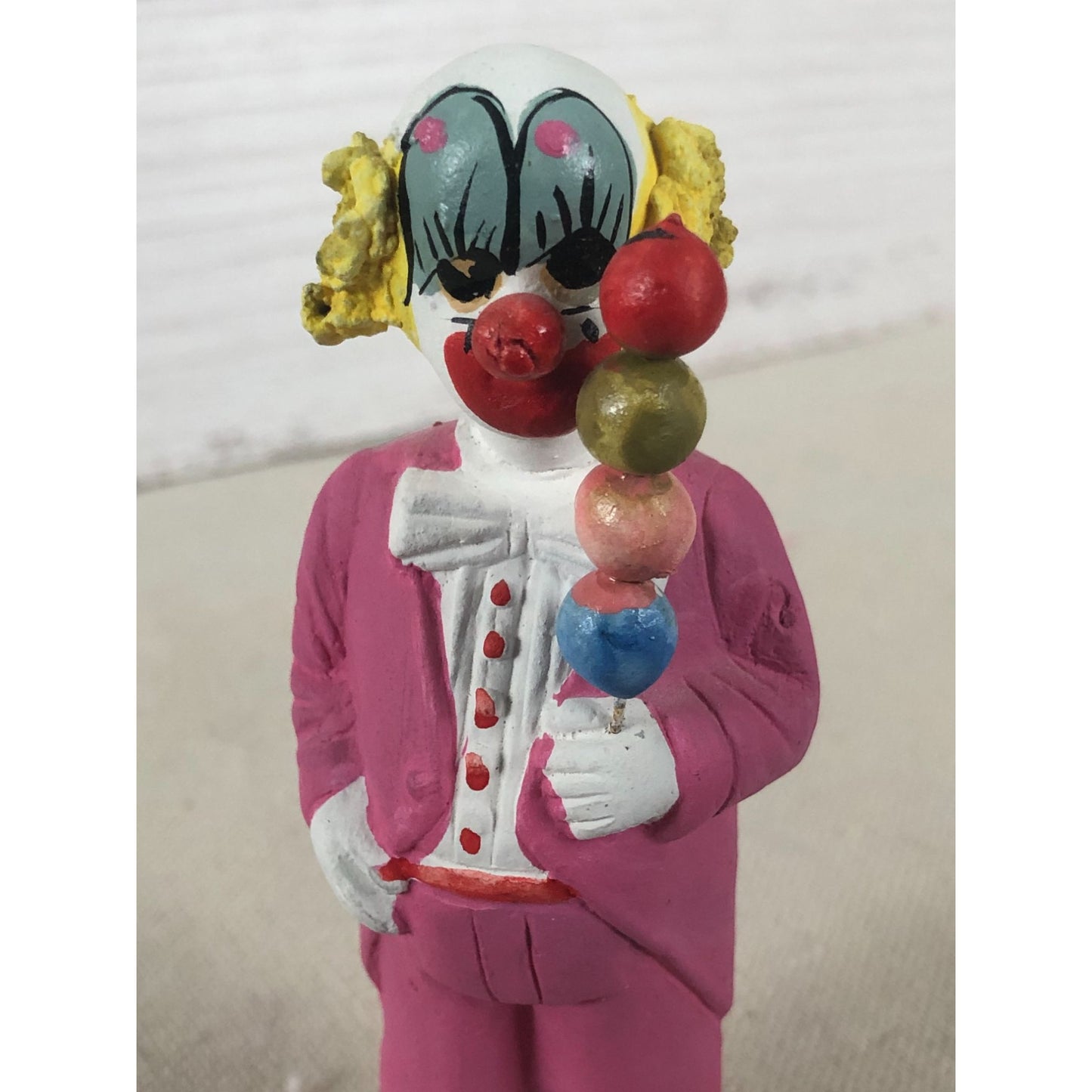 Vintage Mexican Folk Art Paper Mache Clown in Pink Holding Four Balls on a Stick