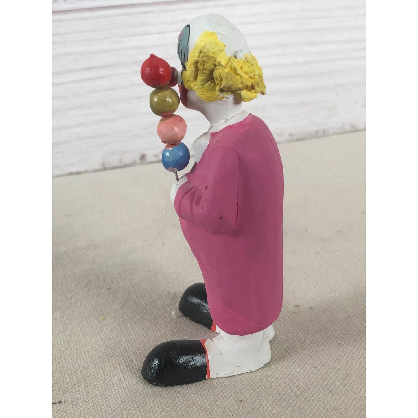 Vintage Mexican Folk Art Paper Mache Clown in Pink Holding Four Balls on a Stick