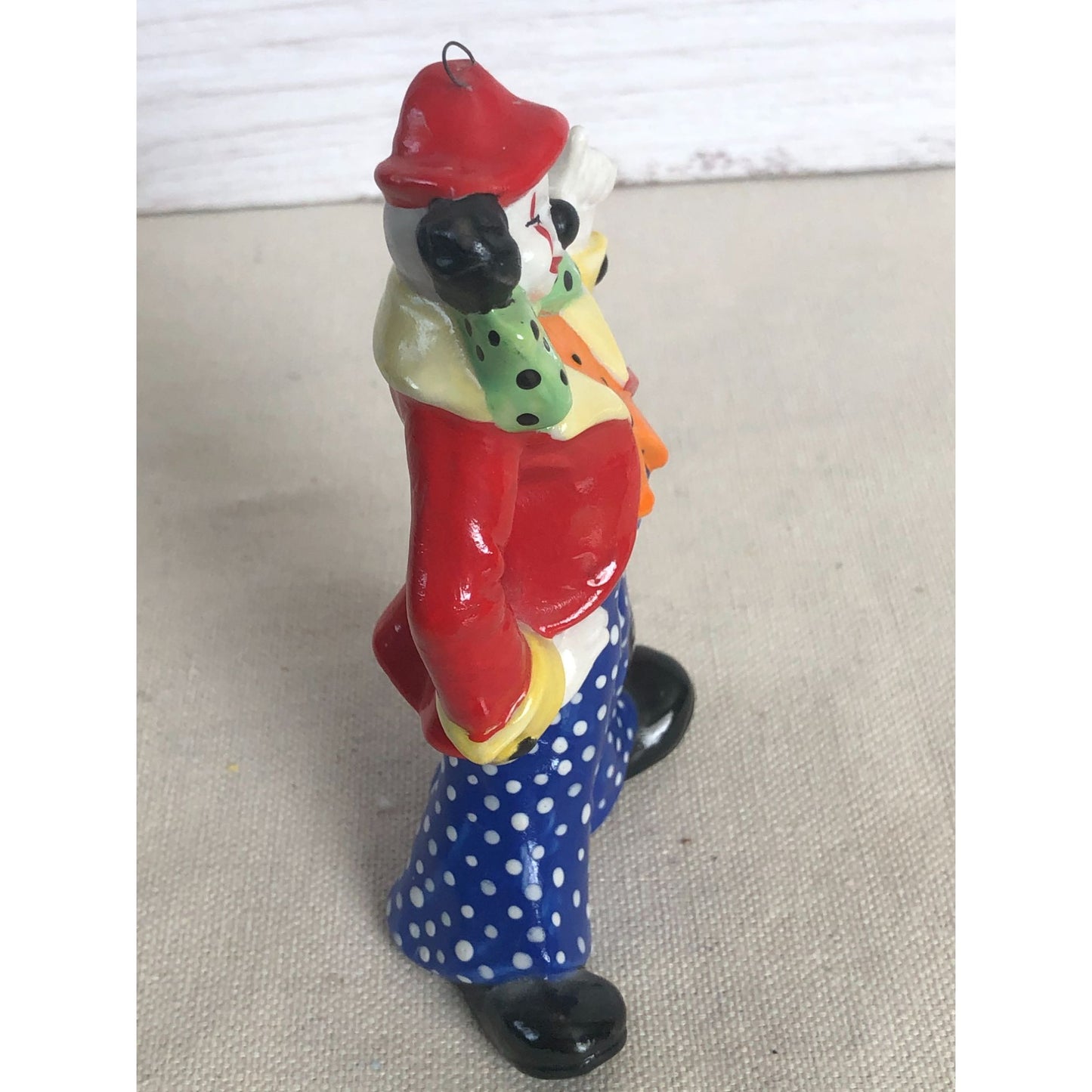 1984 Ceramic Squinting Clown Red Coat Polka Dot Pants Ornament Signed "Paula"
