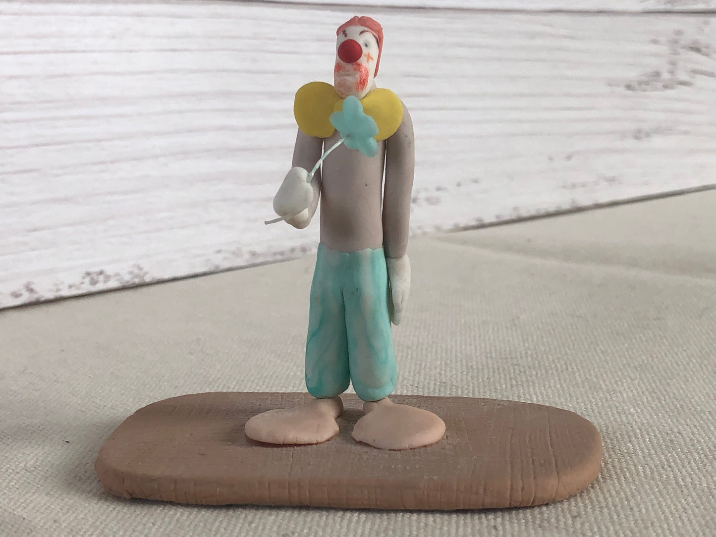 Folk Art Polymer Clay Clown Holding Flower Figurine Signed