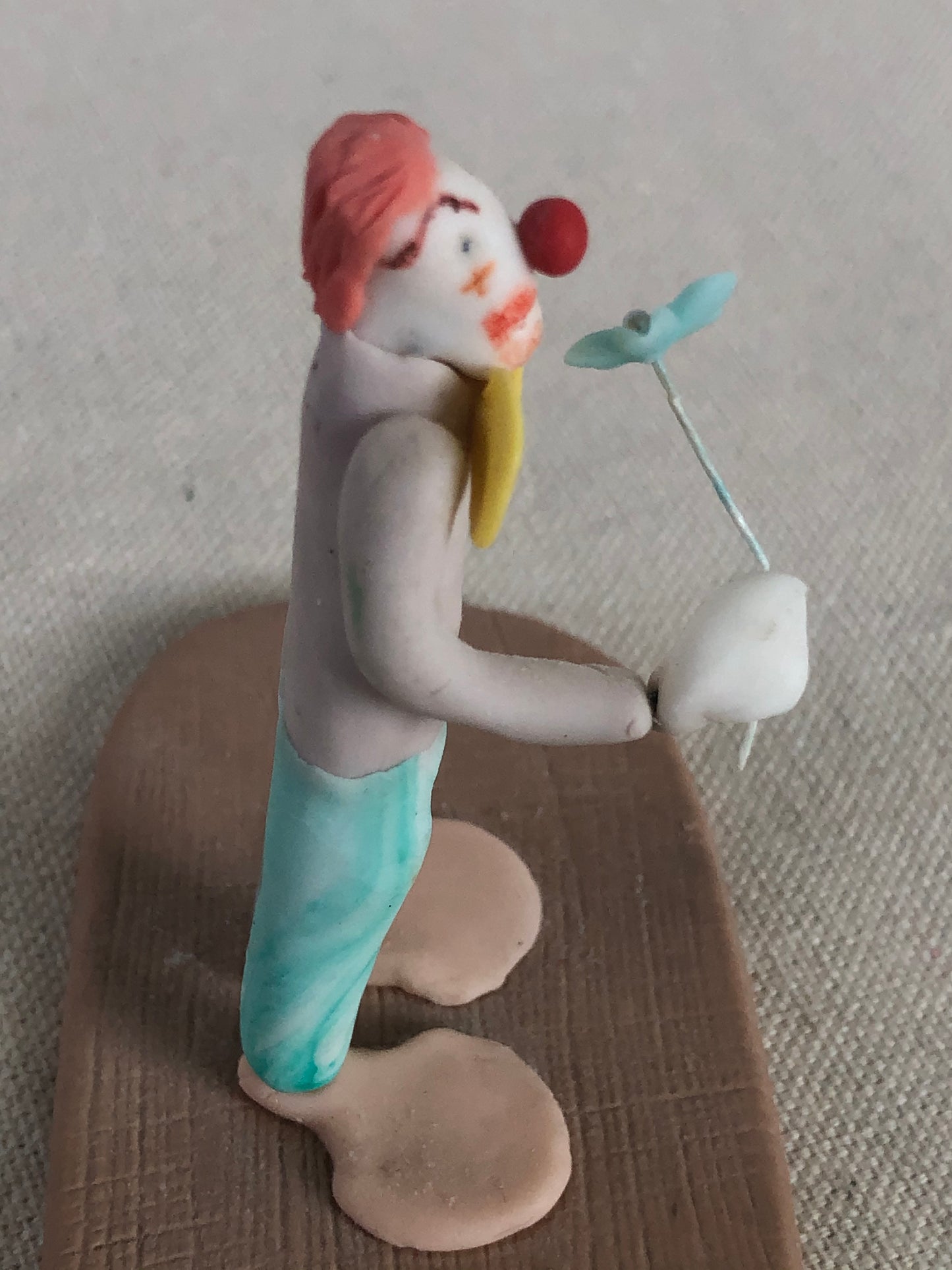 Folk Art Polymer Clay Clown Holding Flower Figurine Signed