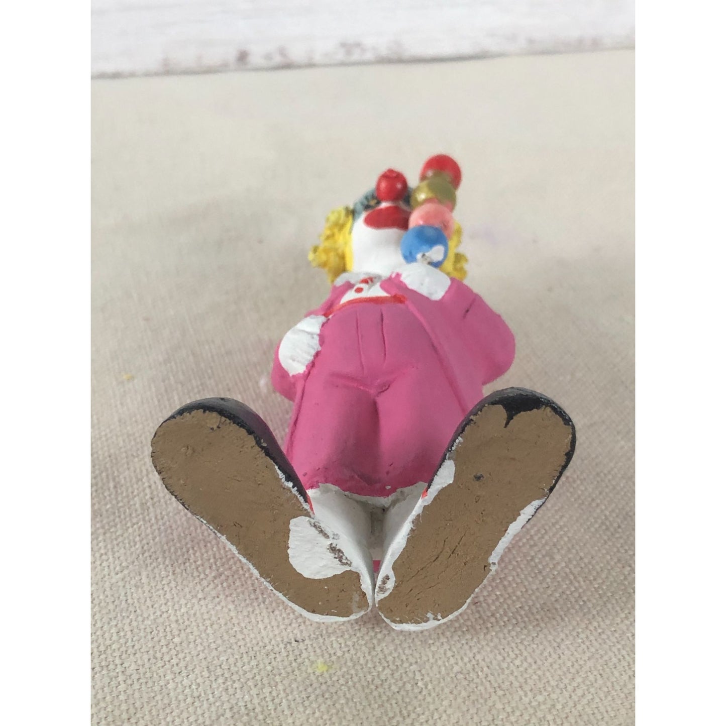 Vintage Mexican Folk Art Paper Mache Clown in Pink Holding Four Balls on a Stick