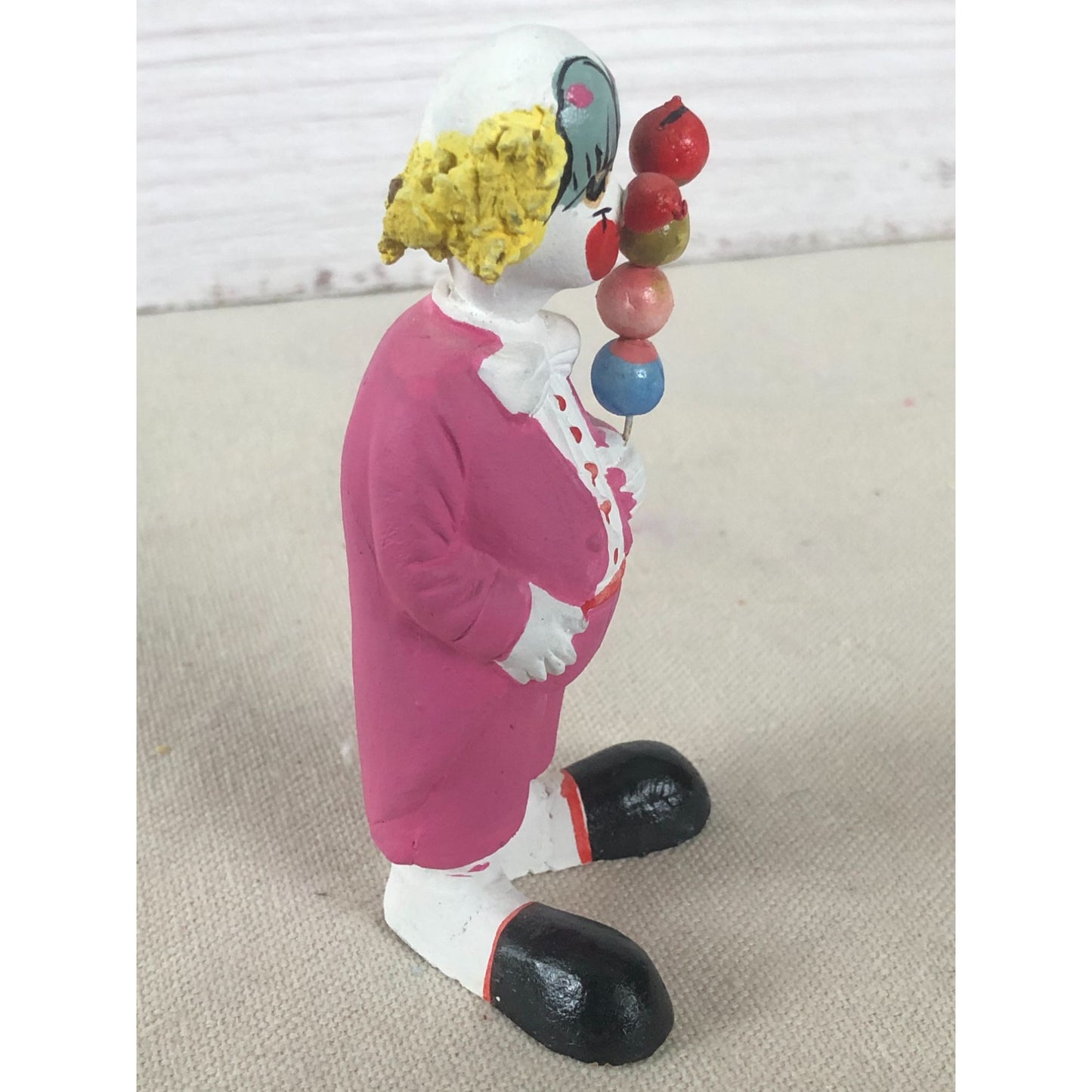 Vintage Mexican Folk Art Paper Mache Clown in Pink Holding Four Balls on a Stick