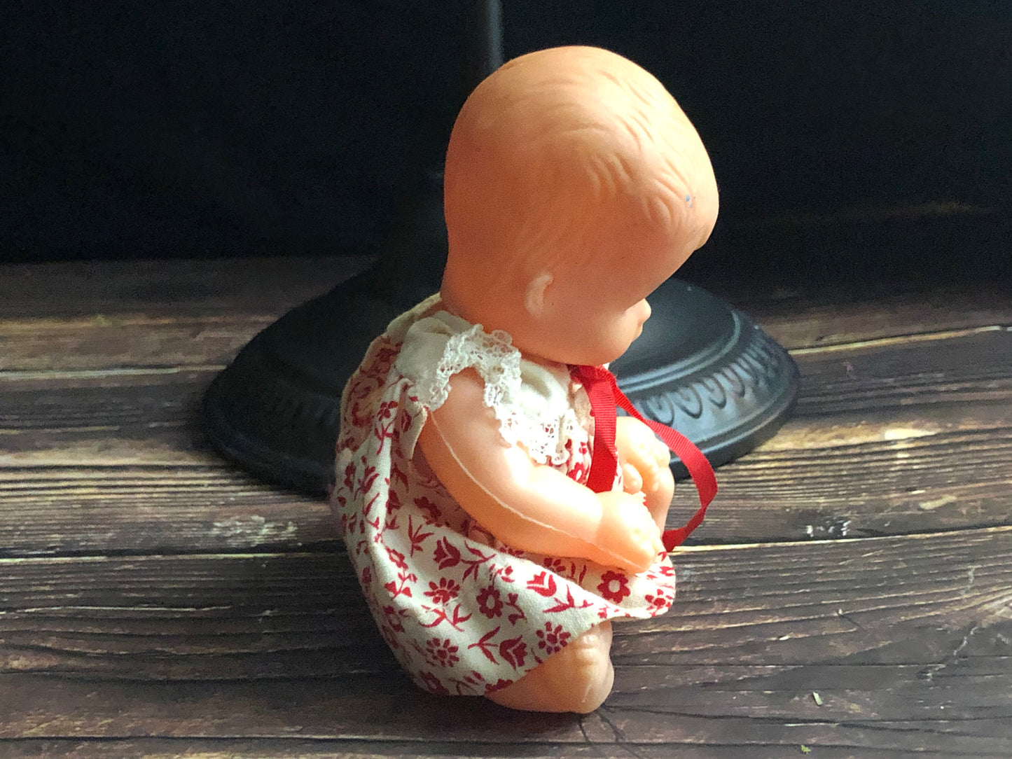 Vintage Drink and Wet 5-1/2" Baby Doll Rubber Head Molded Hair in a White and Red Floral Dress, Buddha Belly Baby Doll