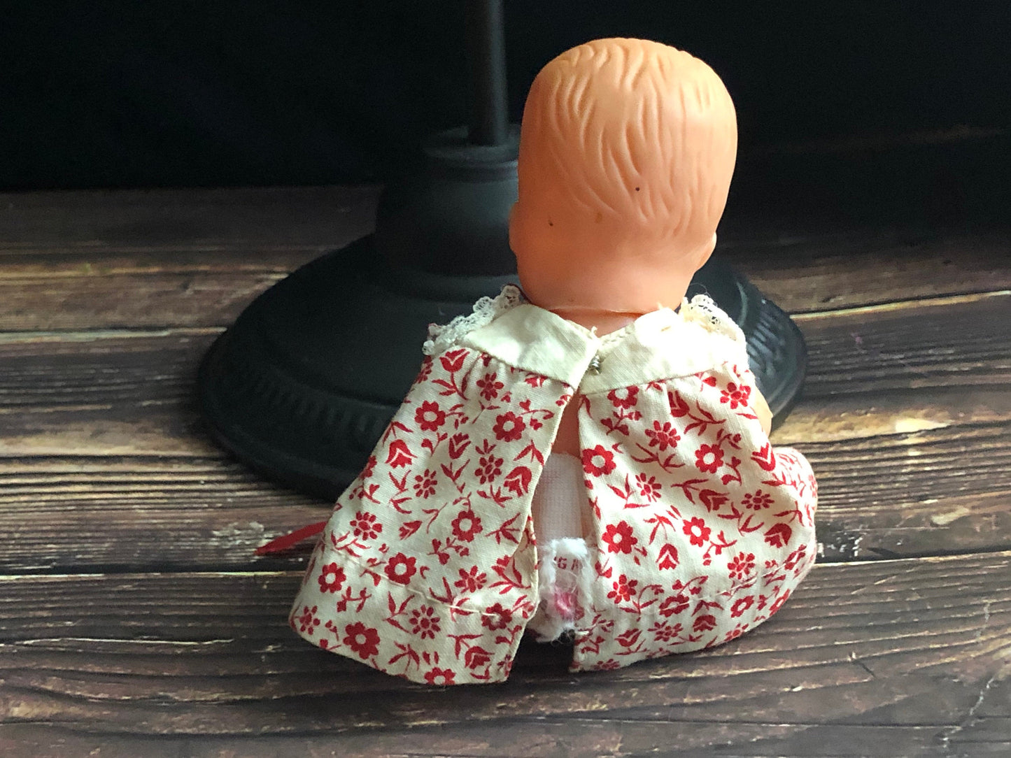 Vintage Drink and Wet 5-1/2" Baby Doll Rubber Head Molded Hair in a White and Red Floral Dress, Buddha Belly Baby Doll