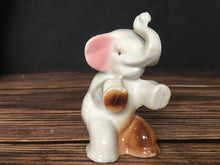 Load image into Gallery viewer, High Gloss Porcelain Elephant Sitting Trunk Up with Pink Ears Made in Japan
